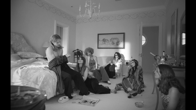 Video Reference: Black, Picture frame, Flash photography, Black-and-white, Lighting, Interior design, Comfort, Grey, Style, Living room