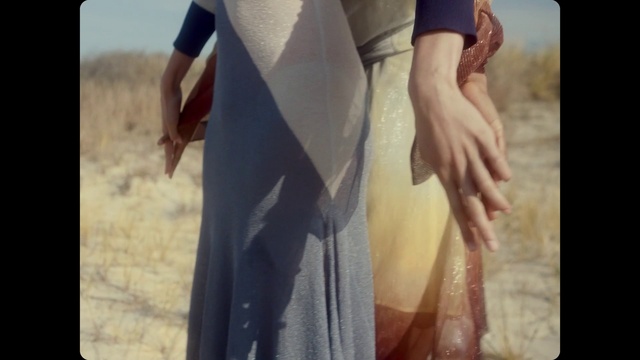 Video Reference: Sleeve, Waist, Flash photography, Gesture, Happy, Blazer, Elbow, Street fashion, Formal wear, Trunk