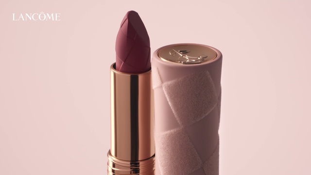 Video Reference: Lipstick, Liquid, Cylinder, Tints and shades, Cone, Magenta, Office supplies, Font, Metal, Audio equipment