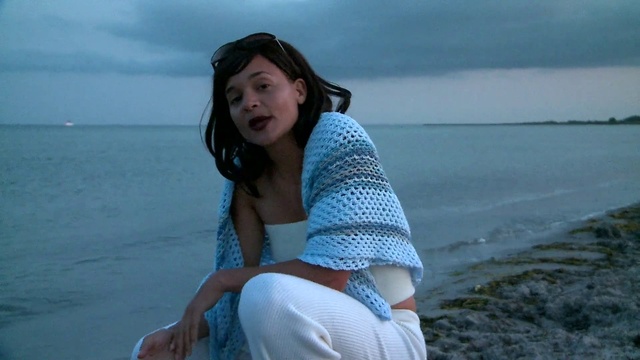 Video Reference: Water, Sky, Hairstyle, Eye, Azure, Flash photography, Sleeve, Happy, Thigh, Beach