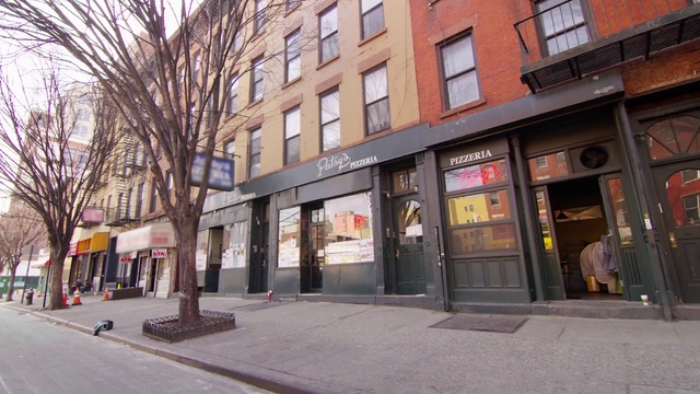 Video Reference: Building, Window, Architecture, Tree, Door, Road surface, Neighbourhood, Urban design, Fixture, Sidewalk