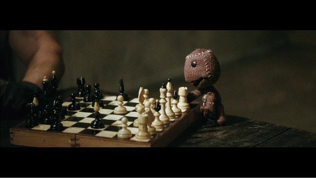 Video Reference: chess, chessboard, game, strategy, toy, doll, knitted, table, board game, pieces, midgame, indoor, dark background, close-up