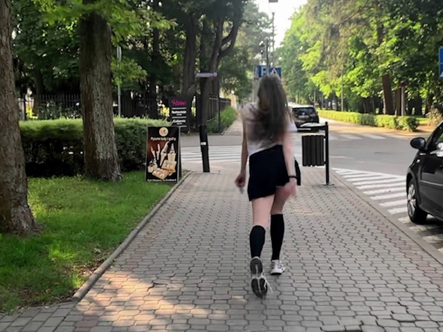 Video Reference: Plant, Tree, Dress, Road surface, Asphalt, Standing, Waist, Thigh, Knee, Car