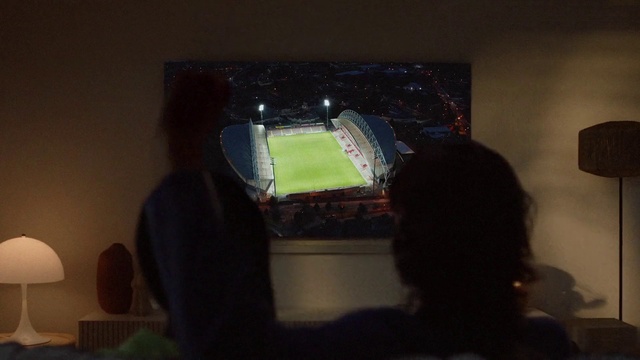 Video Reference: Building, Art, Tints and shades, House, Space, Display device, Event, Linens, Sport venue, Rectangle