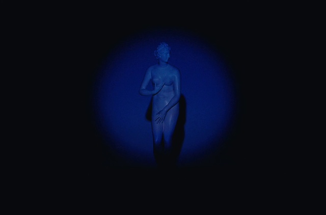 Video Reference: Shoulder, Sculpture, Statue, Art, Performing arts, Chest, Electric blue, Entertainment, Monument, Event