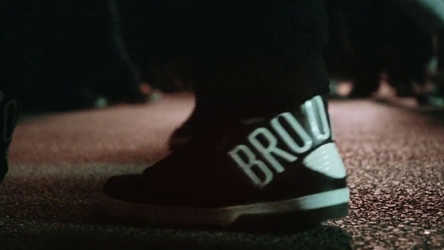 Video Reference: Asphalt, Walking shoe, Road surface, Grey, Outdoor shoe, Knee, Sportswear, Flooring, Grass, Tints and shades