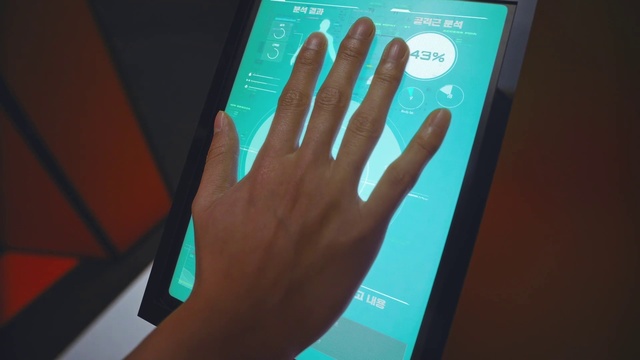Video Reference: Gesture, Finger, Thumb, Communication Device, Nail, Wrist, Gadget, Font, Electronic device, Electric blue