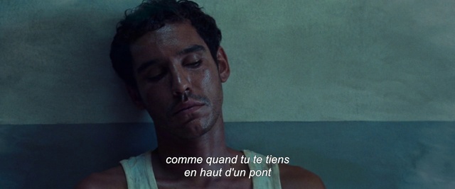 Video Reference: Forehead, Nose, Eyebrow, Eyelash, Flash photography, Jaw, Gesture, Beard, Black hair, Facial hair