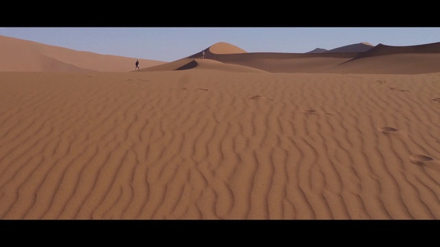 Video Reference: Brown, Sky, Cloud, Natural landscape, Slope, Morning, Tints and shades, Erg, Horizon, Singing sand