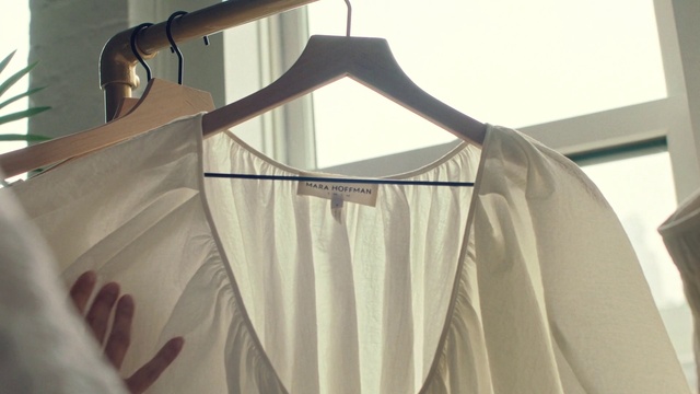 Video Reference: Outerwear, Sleeve, Wood, Shade, Undergarment, Fashion design, Tints and shades, Clothes hanger, Formal wear, Linens