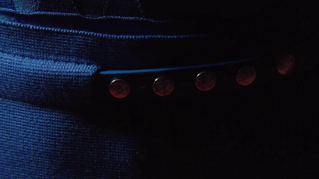 Video Reference: Outerwear, Sleeve, Collar, Sportswear, Denim, Electric blue, Button, Jersey, Gadget, Audio equipment