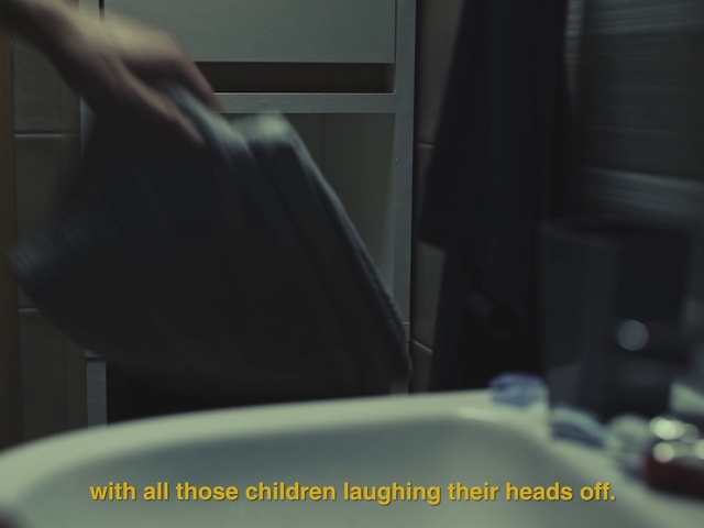 Video Reference: Gesture, Elbow, Thigh, Wrist, Thumb, Human leg, Darkness, Knee, Waist, Sitting