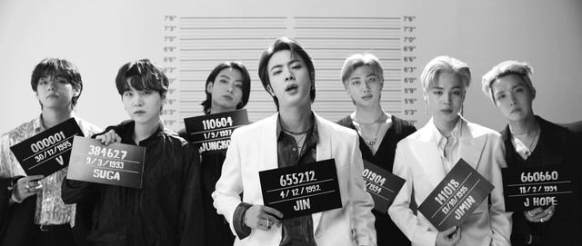 Video Reference: Hair, Outerwear, White, Black, Sleeve, Black-and-white, Coat, Gesture, Style, Font