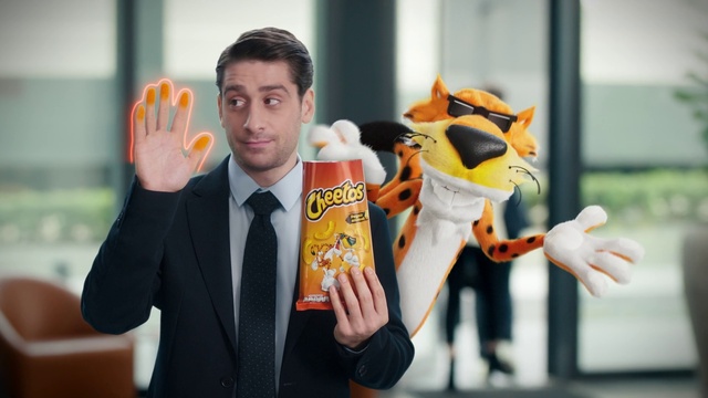 Video Reference: Hand, Orange, Tie, Gesture, Finger, Suit, Happy, Blazer, Toy, Formal wear