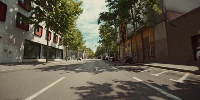 Video Reference: Sky, Cloud, Road surface, Tree, Window, Asphalt, Sunlight, Mode of transport, Building, Urban design
