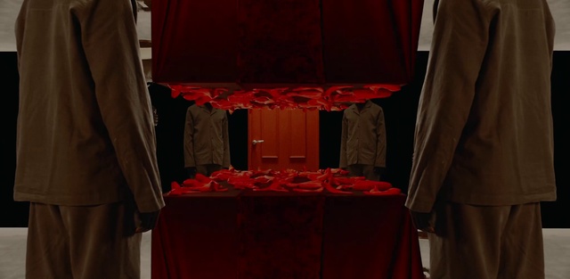 Video Reference: Table, Tableware, Textile, Orange, Tablecloth, Sleeve, Interior design, Red, Blazer, Event