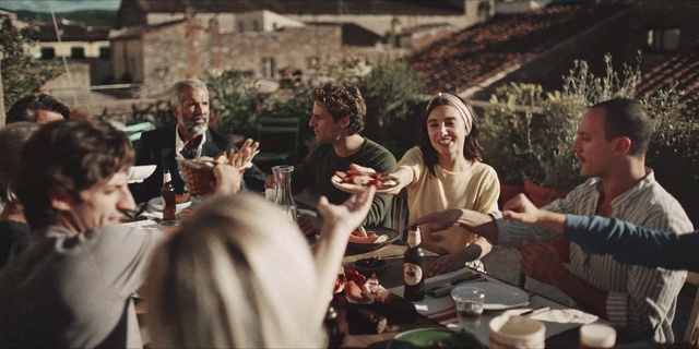 Video Reference: Tableware, Shirt, Table, Plant, Interaction, Chair, Drink, Plate, Wine glass, Alcoholic beverage