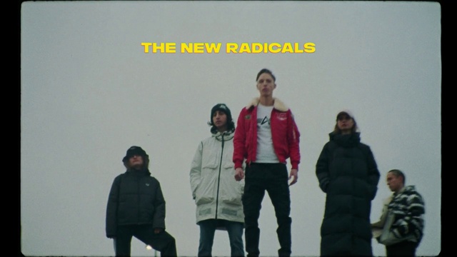Video Reference: Outerwear, Sleeve, Gesture, Jacket, Fashion design, Event, Fun, Font, Team, Stage equipment