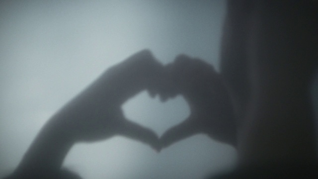 Video Reference: Jaw, Flash photography, Gesture, Font, Darkness, Monochrome photography, Wing, Fictional character, Symmetry, Monochrome