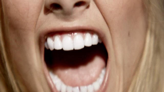 Video Reference: close-up, mouth, open mouth, teeth, face, human, expression, scream, talking, lips, nose, skin, blonde hair, portrait, extreme close-up