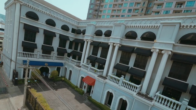 Video Reference: Plant, Building, Window, Sky, Urban design, Condominium, Facade, City, Baluster, Mixed-use