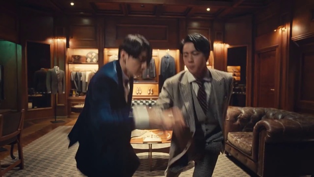 Video Reference: Flash photography, Gesture, Fun, Formal wear, Couch, Suit, Event, studio couch, Conversation, Tie