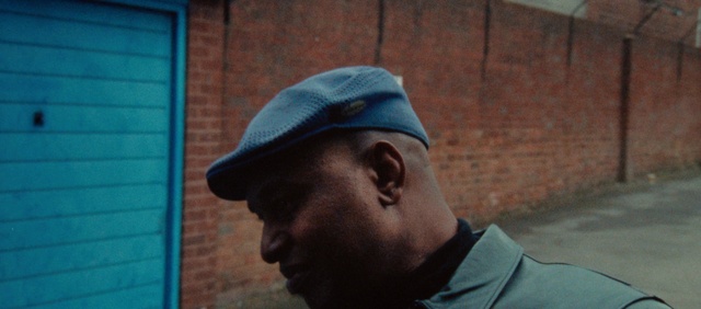 Video Reference: Clothing, Forehead, Chin, Outerwear, Cap, Beard, Jaw, Sleeve, Headgear, T-shirt