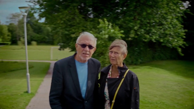 Video Reference: Plant, Tree, Gesture, Grass, Leisure, Formal wear, Lawn, Grass family, Recreation, Event