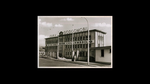 Video Reference: Window, Rectangle, Building, Sky, Black-and-white, Font, Fixture, Cloud, Tints and shades, Facade