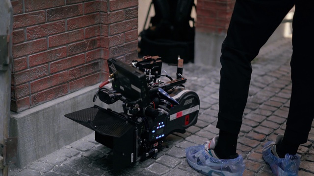 Video Reference: Shoe, Black, Road surface, Asphalt, Automotive tire, Gas, Motor vehicle, Engineering, Sidewalk, Human leg