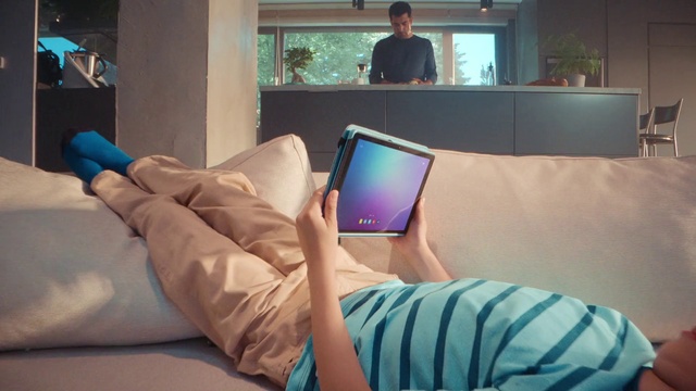 Video Reference: Furniture, Comfort, Leg, Couch, Gadget, Textile, Finger, Gesture, Communication Device, Output device