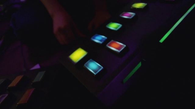 Video Reference: Communication Device, Electronic instrument, Gadget, Visual effect lighting, Automotive lighting, Nail, Audio equipment, Electric blue, Font, Magenta