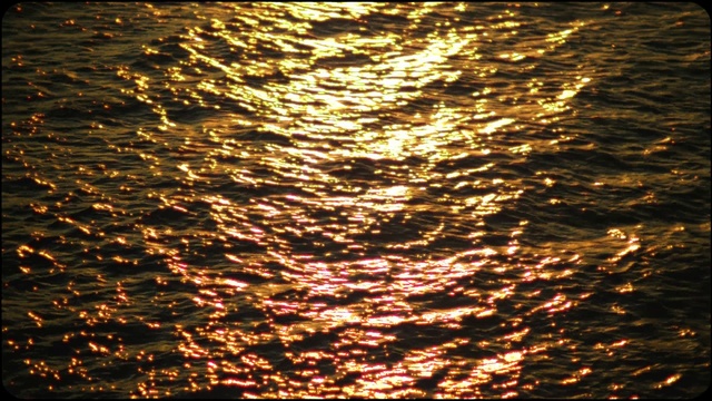 Video Reference: Water, Amber, Liquid, Gold, Fluid, Sunlight, Sunset, Astronomical object, Sunrise, Lake
