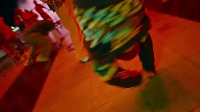 Video Reference: Orange, Entertainment, Flooring, Performing arts, Wood, Human leg, Art, Event, Petal, Hardwood