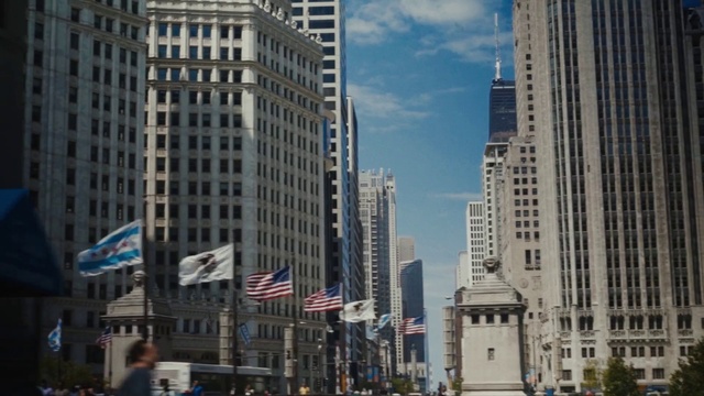 Video Reference: Cloud, Building, Skyscraper, Sky, Daytime, Window, Tower block, Flag of the united states, Tower, Urban design