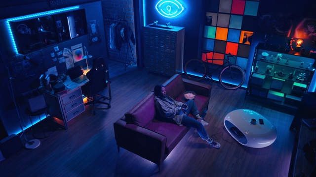 Video Reference: Light, Purple, Blue, Entertainment, Interior design, Couch, Architecture, Visual effect lighting, Space, Electric blue