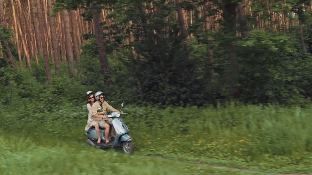 Video Reference: Tire, Plant, Wheel, Plant community, Vehicle, Motorcycle, People in nature, Tree, Grass, Landscape