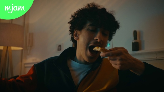 Video Reference: Forehead, Mouth, Jheri curl, Green, Organ, Jaw, Gesture, Beard, Ringlet, Food