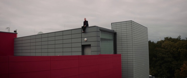 Video Reference: Sky, Cloud, Grey, Composite material, Facade, Wood, Brickwork, Rectangle, Brick, Tree