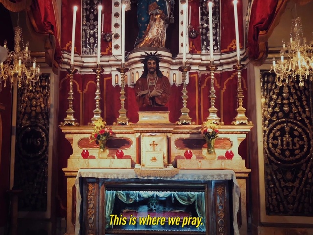 Video Reference: Building, Interior design, Decoration, Religious item, Temple, Chair, Event, Holy places, Chapel, Religious institute