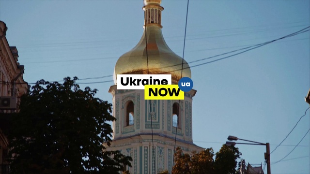 Video Reference: Sky, Tree, City, Facade, Building, Street light, Gas, Font, Electricity, Urban area