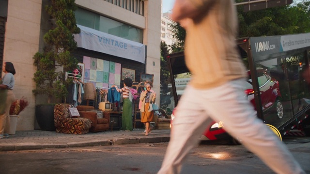 Video Reference: Human, Building, Waist, Performing arts, Thigh, Public space, Leisure, Entertainment, Human leg, Road