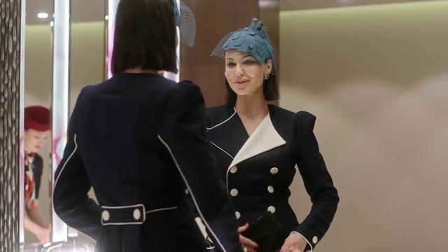 Video Reference: Smile, Textile, Military uniform, Sleeve, Military person, Gesture, Waist, Security, Fashion design, Non-commissioned officer