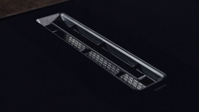 Video Reference: Font, Gadget, Rectangle, Bumper, Automotive exterior, Automotive design, Automotive lighting, Electric blue, Fashion accessory, Personal luxury car