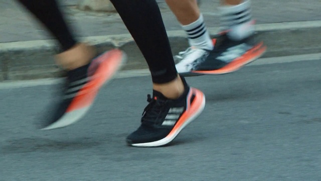 Video Reference: Shoe, White, Knee, Street fashion, Calf, Thigh, Shorts, Sportswear, Asphalt, Sock