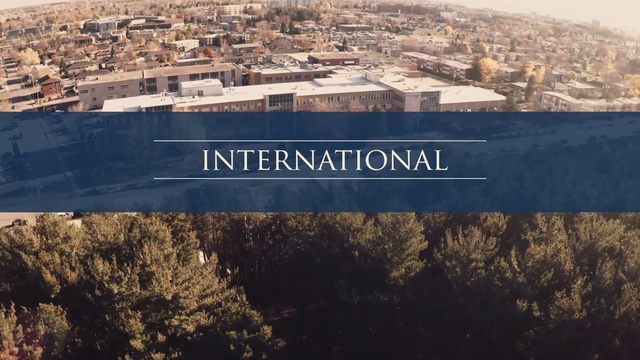 Video Reference: Sky, World, Urban design, Font, Tree, Building, Landscape, Mountainous landforms, City, Roof