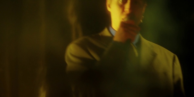 Video Reference: Flash photography, Jaw, Gesture, Beard, Entertainment, Elbow, Facial hair, Event, T-shirt, Darkness