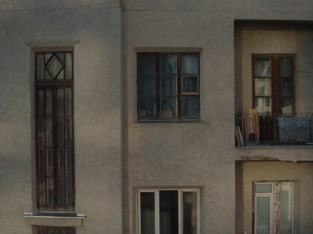Video Reference: Brown, Window, Building, Fixture, Wood, Rectangle, Grey, Neighbourhood, Material property, Brick