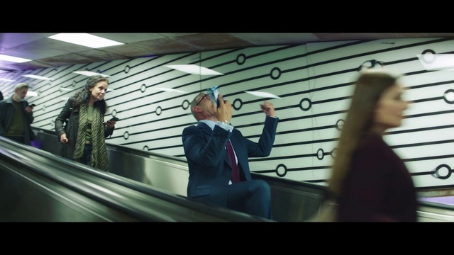Video Reference: Flash photography, Gesture, Interaction, Font, Formal wear, Entertainment, Fun, White-collar worker, Air travel, Display device