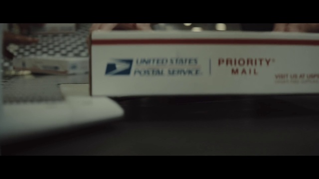 Video Reference: Rectangle, Computer keyboard, Font, Display device, Event, Brand, Office equipment, Signage, Electric blue, Automotive exterior